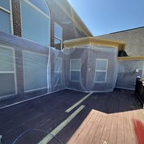 Exterior prep with protective sheeting before painting